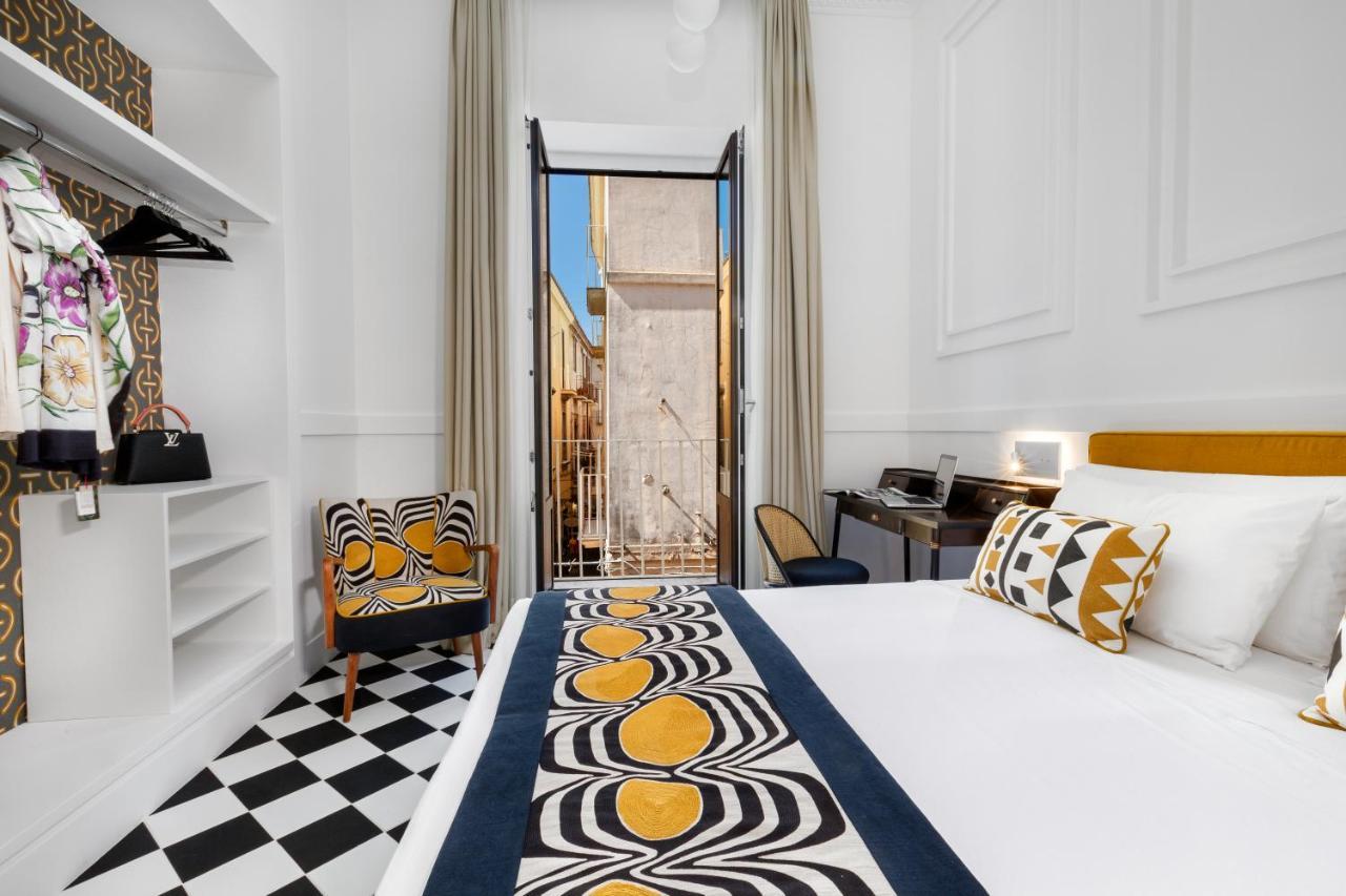 Suite con balcón y vistas a la ciudad