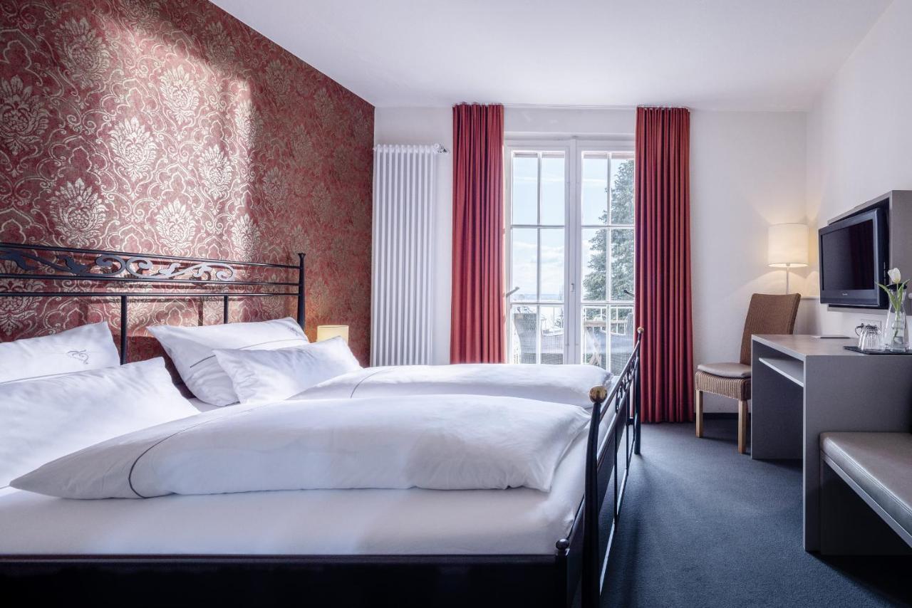 Kleines Doppelzimmer mit einem Balkon und Seeblick