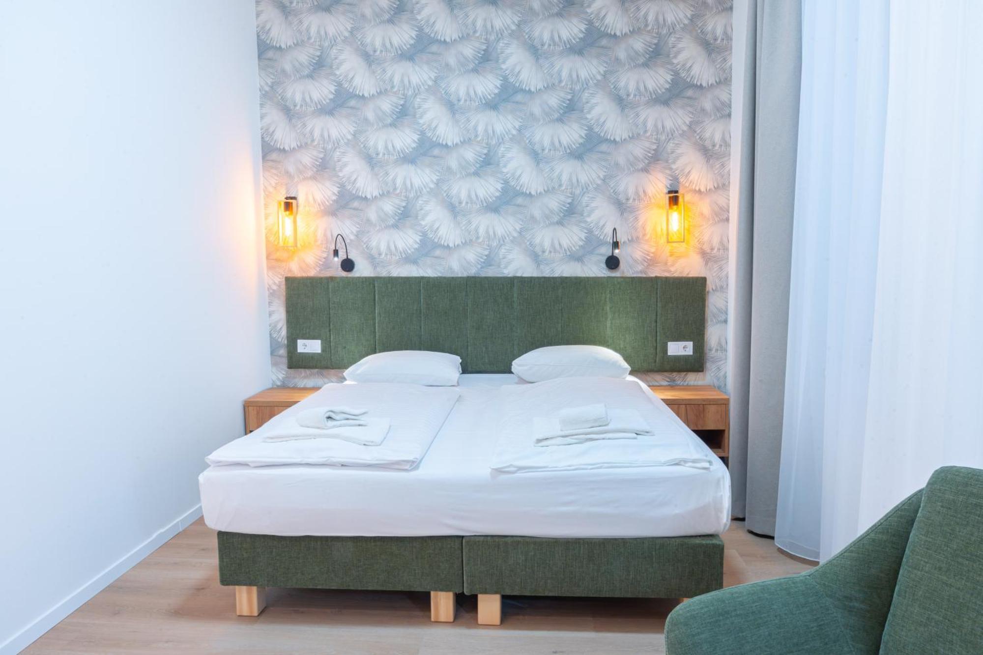 Standard Doppel- oder Zweibettzimmer mit Gartenblick