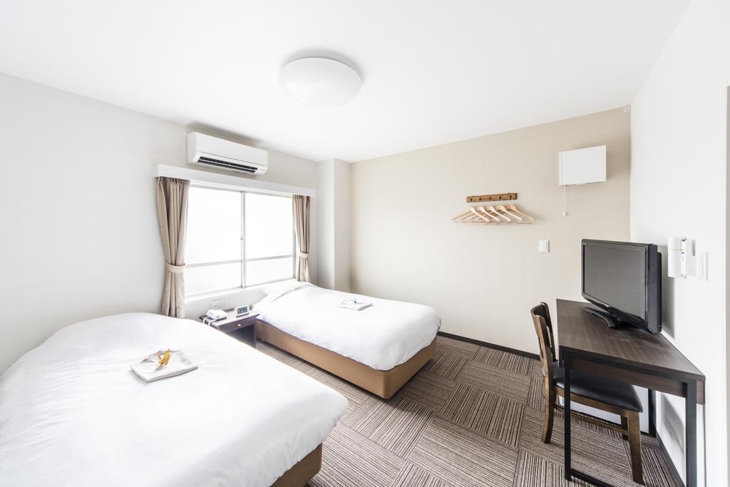 Chambre Lits Jumeaux avec Lit d’Appoint
