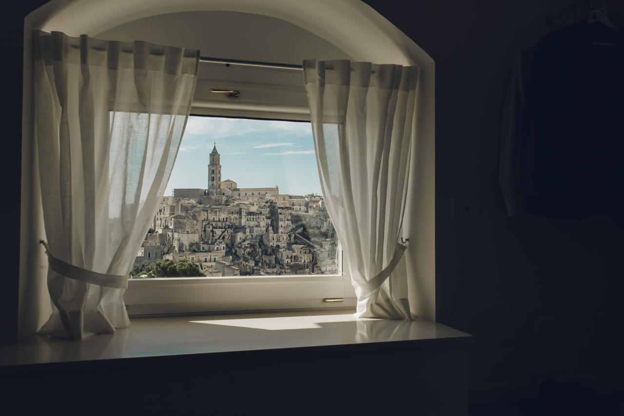 Dreibettzimmer mit Stadtblick