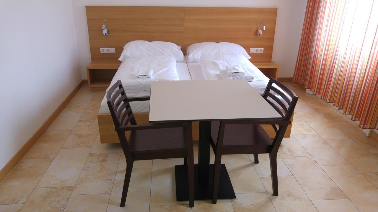 Quarto Duplo
