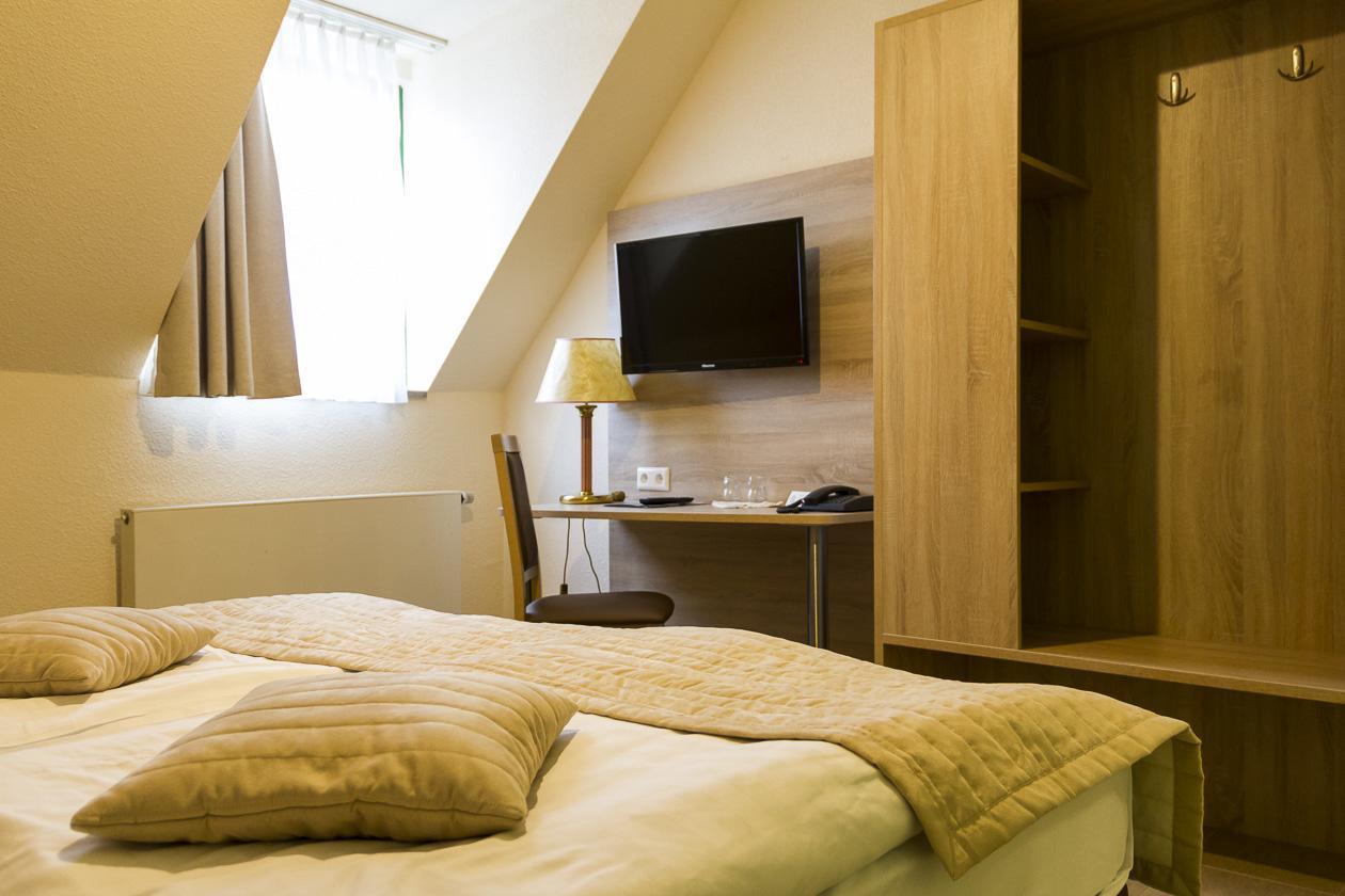 Doppel- oder Zweibettzimmer